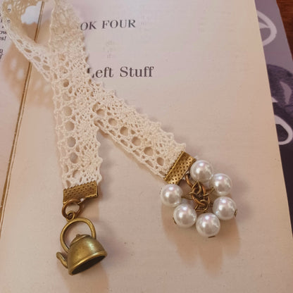 Beige ribbon bookmark with beads and vintage charms - alice in wonderland theme bookmark