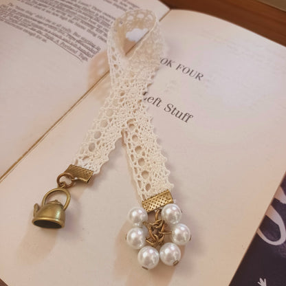 Beige ribbon bookmark with beads and vintage charms - alice in wonderland theme bookmark